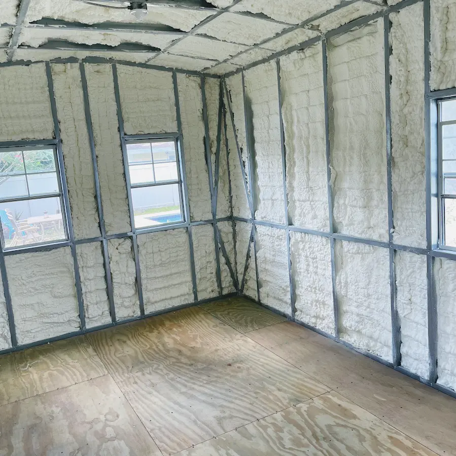 Closed-cell spray foam insulation applied to wall cavities in a residential project in World Golf Village
